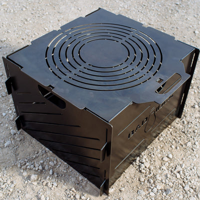 PYRO Small Burn Cage (16") with included lid and riser base — studio view