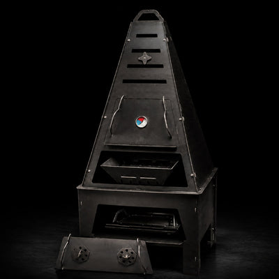 Pyro Tower Complete Kit — thermometer top door, charcoal basket, grill grate and pedestal, studio view