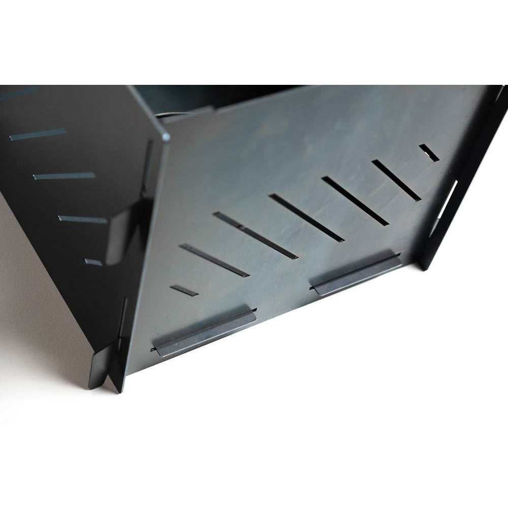 Close-up of the laser-cut vent slots along a Pyro Cage MINI panel edge