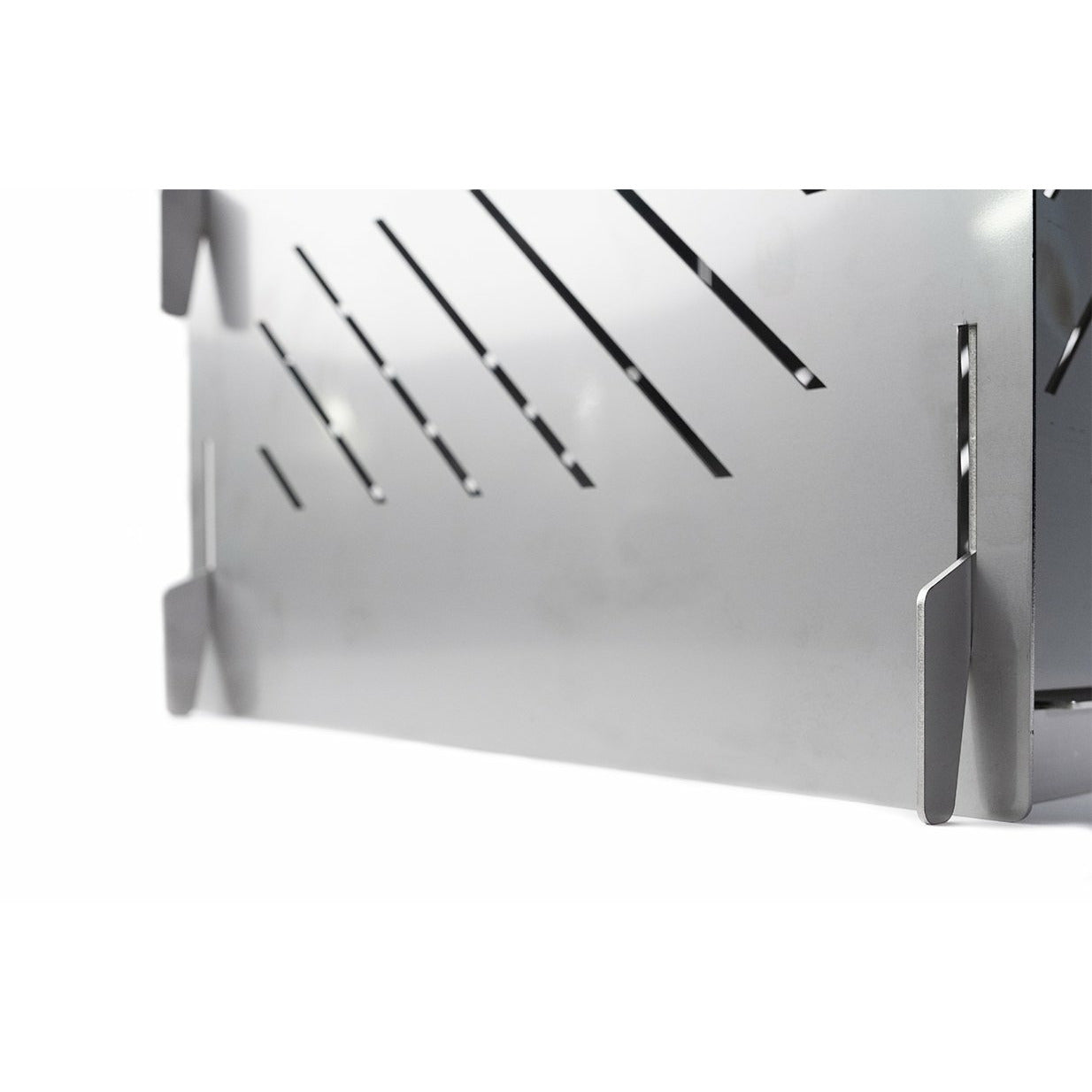 Close-up of the angled air slots on a Stainless Steel Pyro Cage MINI panel