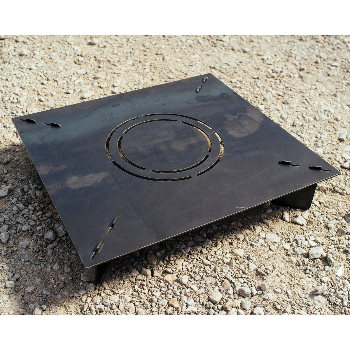 Medium Pyro Cage riser base standing on its four feet, showing the vent slots