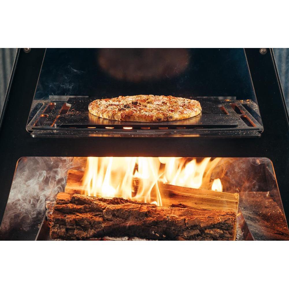 Pizza baking in a Pyro Tower wood oven